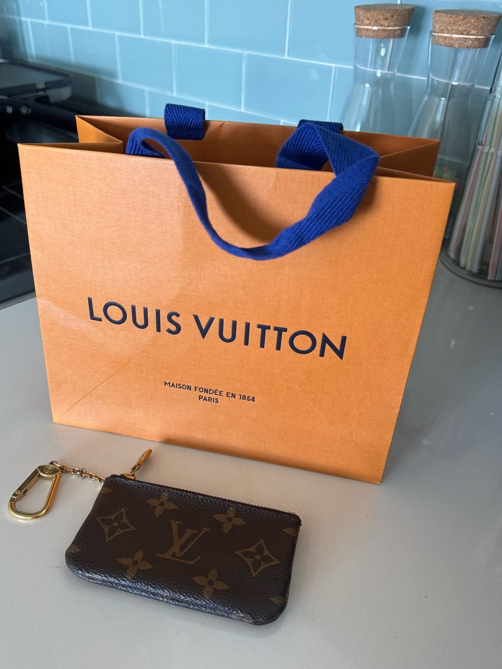 Louis Vuitton Brown Monogram Key Pouch pre-loved